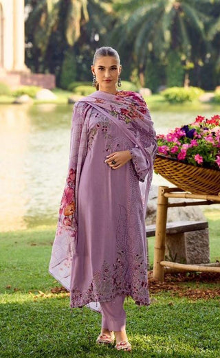 A soft pastel suit adorned with delicate thread embroidery, complemented by a digitally printed floral chiffon dupatta, offering a graceful and feminine ensemble perfect for any occasion.
